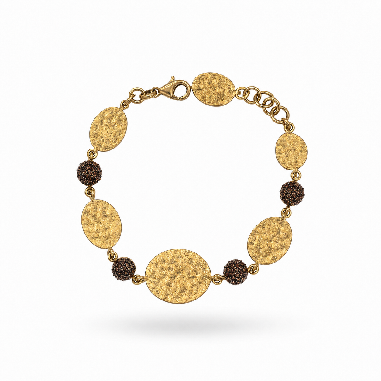 BRACCIALE IN ARGENTO DORATO CON CERCHI MARTELLATI E ZIRCONATI
